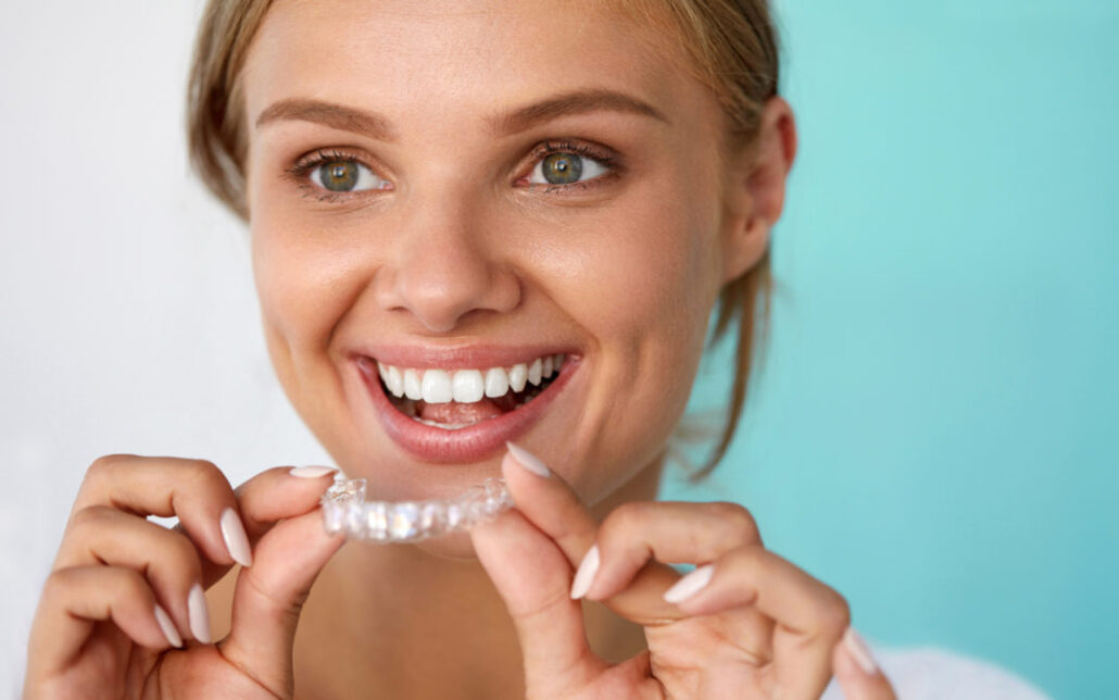 Girl is Holding Braces